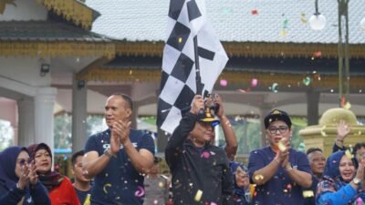 Peringati HKN ke-59, Pemkab Langkat Gelar Gerak Jalan Santai